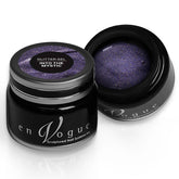 en Vogue into-the-mystic periwinkle glitter gel polish with micro-gold leaf microglitter for professional nails and extensions shown in container