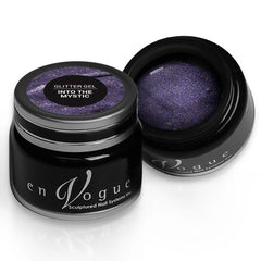 en Vogue into-the-mystic periwinkle glitter gel polish with micro-gold leaf microglitter for professional nails and extensions shown in container